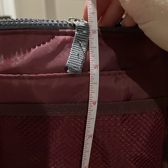 Travel maroon toiletry bag. 10” long by 6” tall. - Picture 9 of 9